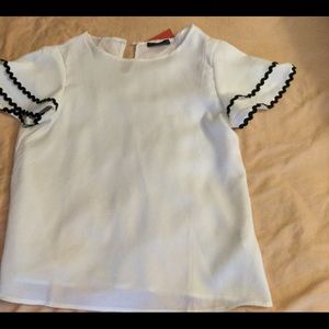 NWOT White polyester top.